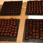 Chocolats réalisés par Philippe Pascoët avec la couverture Belcolade